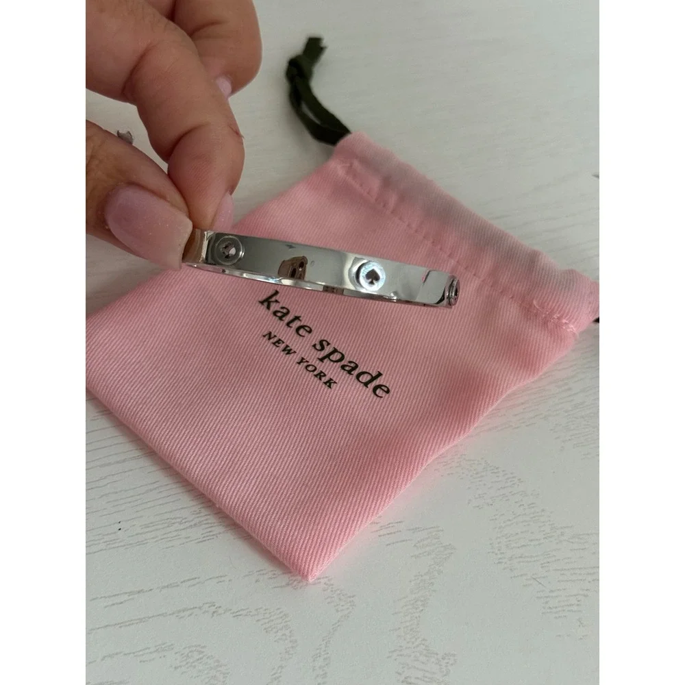 Kate Spade New York Silver Tone Spade Logo Hinged Bangle Bracelet with Dust Bag
